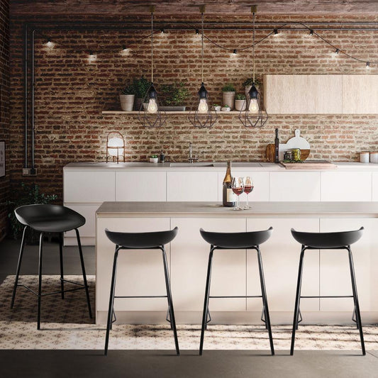 Four black bar stools with low back at kitchen bench