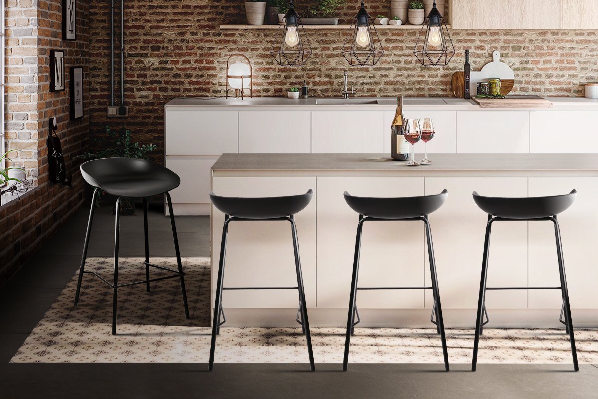 Four black bar stools with low back at kitchen bench